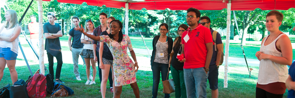 diverse students getting involved in campus activities while playing bags