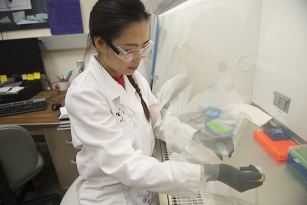 female student in science lab