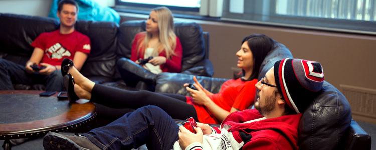 Mentors and students relaxing on a couch